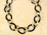 Chain Link Statement Necklace Classic necklace in golden and black.