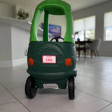 Custom 2.2x3.7 inch mini license plate attached to Cozy Coupe kids car