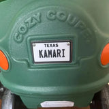 Custom 2.2x3.7 inch mini state license plate attached to Cozy Coupe kids car