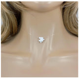White puzzle piece pendant on a clear necklace. Lab Created Opal Puzzle Pendant Floating Illusion Necklace.