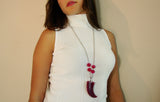 Horn Pendant Necklace Fuchsia. Long necklace with horn pendant in fuchsia