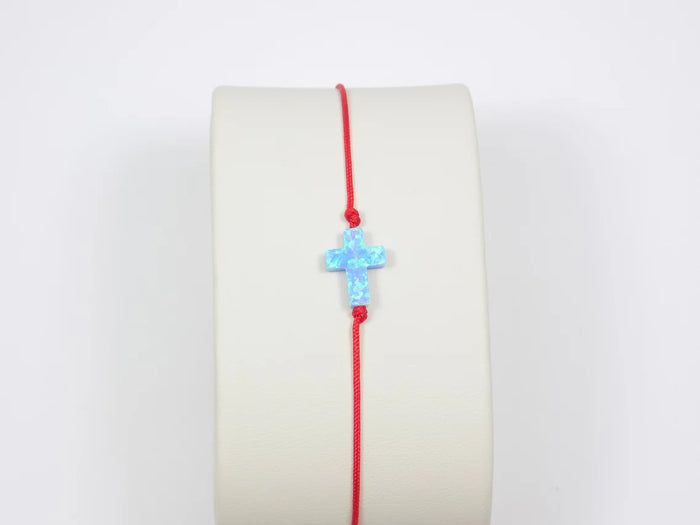 Red bracelet with deals cross